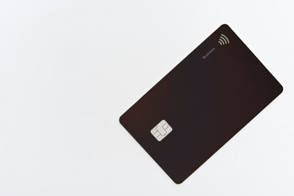 Blank black credit card on a white background